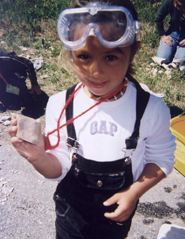 Ariana showing a rock